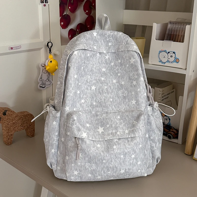 Leichter Schulrucksack mit Sternenmuster und vielen Fächern
