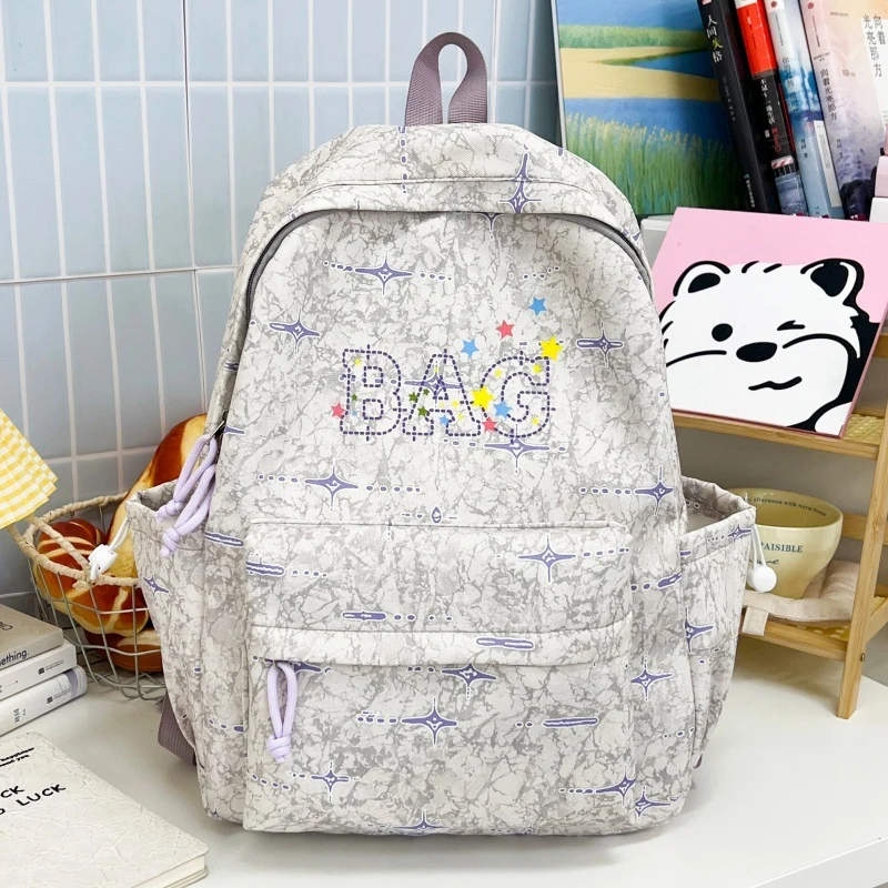 Lustiger gemusterter Schulrucksack