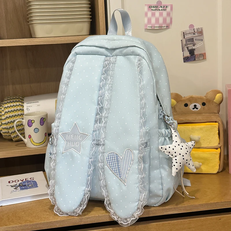 Dekorative Schultasche mit Spitzenbesatz