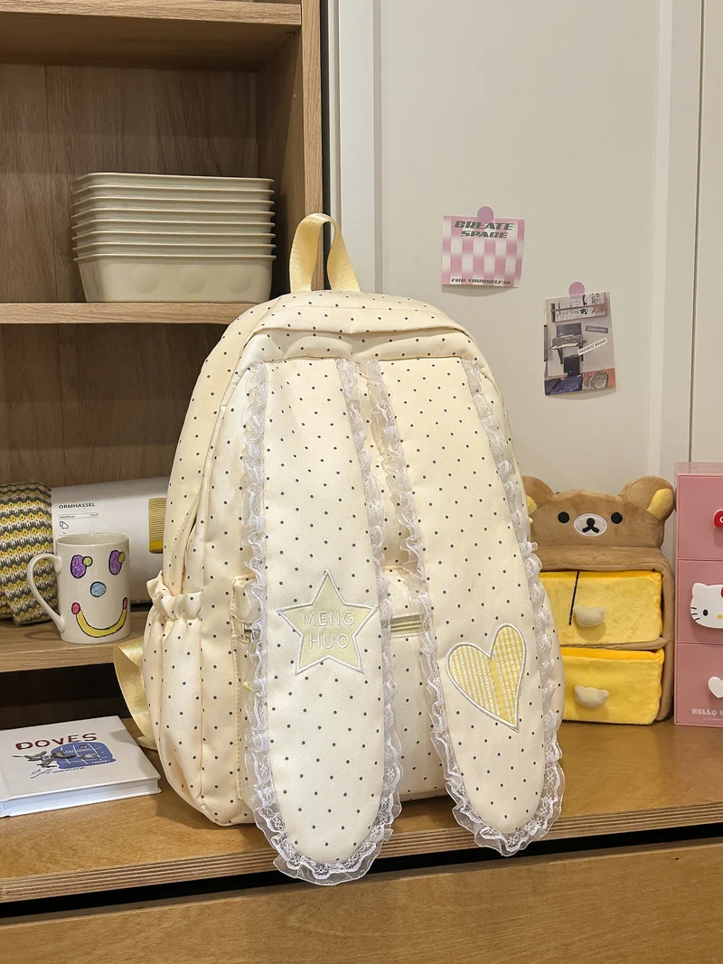 Dekorative Schultasche mit Spitzenbesatz