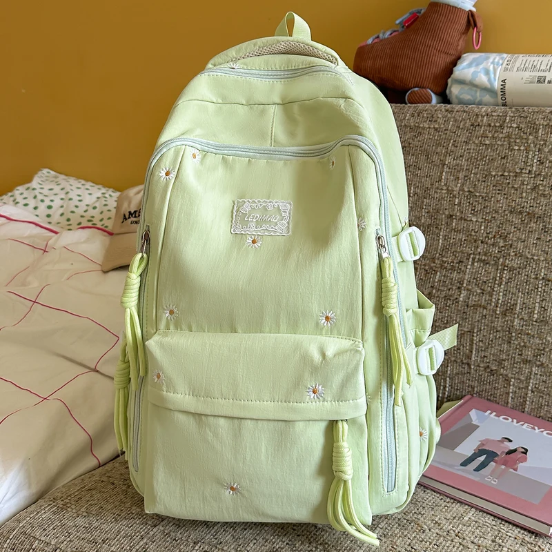 Eleganter Schulrucksack mit floralen Verzierungen