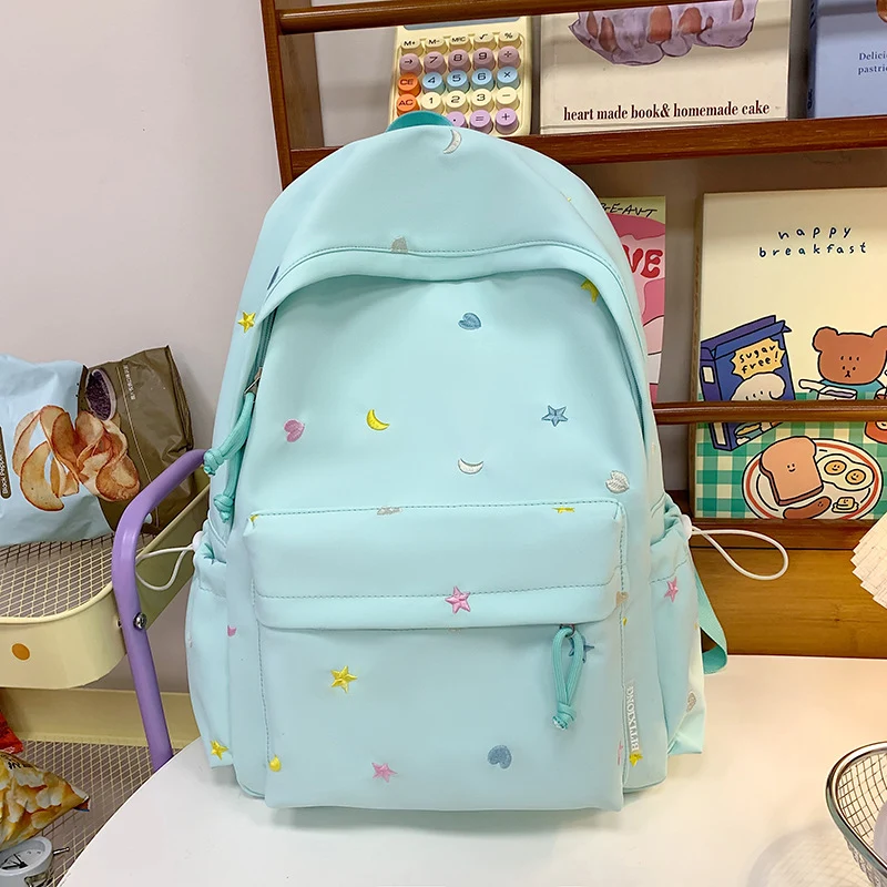 Bestickter Schulrucksack mit Stern- und Mondmuster