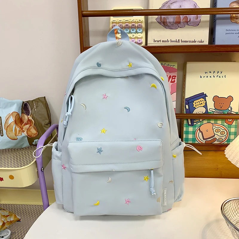 Bestickter Schulrucksack mit Stern- und Mondmuster