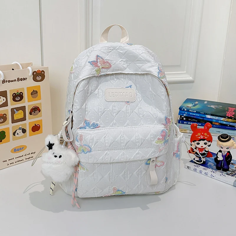 Bestickter Schulrucksack mit Blumenmotiv