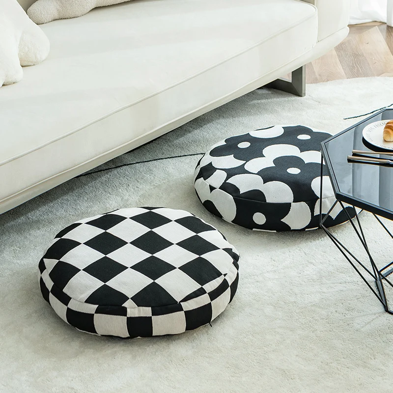 Rundes dekoratives Sitzkissen mit floraler Jacquard‑Struktur