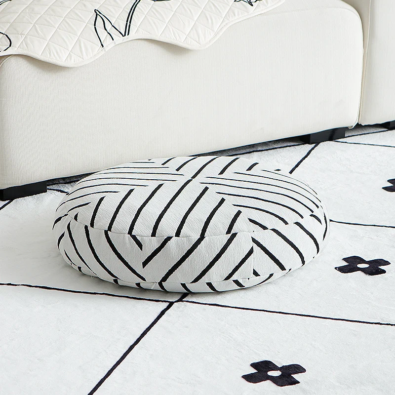 Rundes dekoratives Sitzkissen mit floraler Jacquard‑Struktur