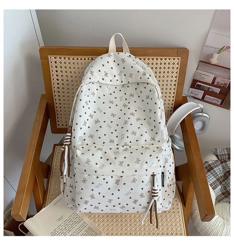 Niedlicher Schulrucksack mit dekorativem Muster
