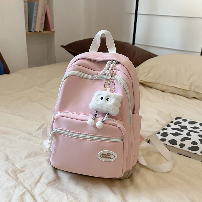 Niedlicher kompakter Schulrucksack mit mehreren Fächern