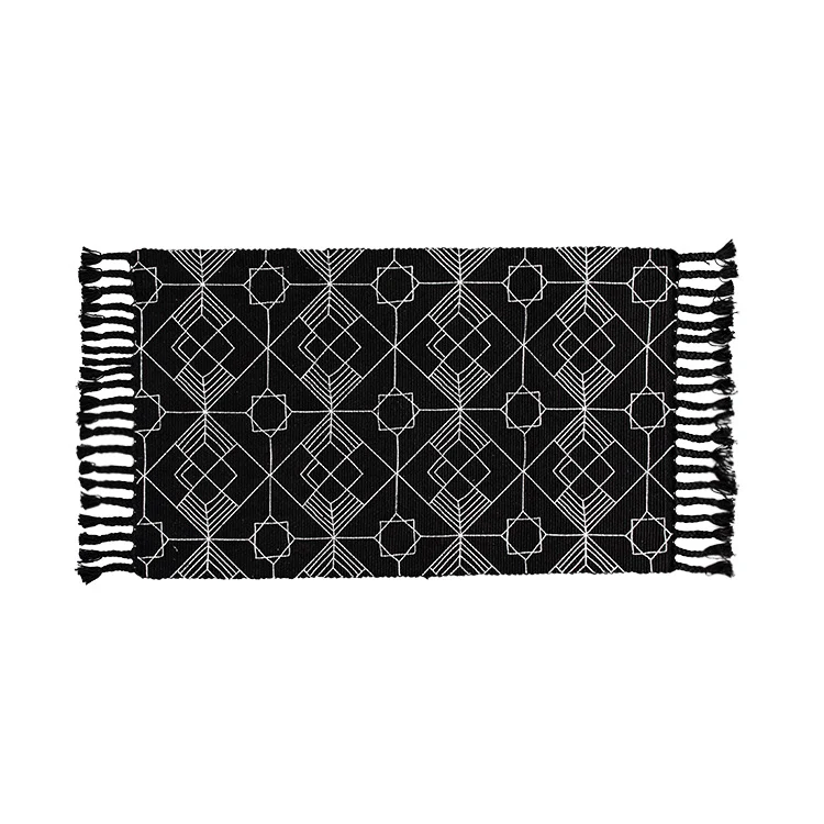 Flachgewebter Baumwoll-Tischläufer im Art-Deco‑Geometrie‑Jacquard mit handfransiger Kante