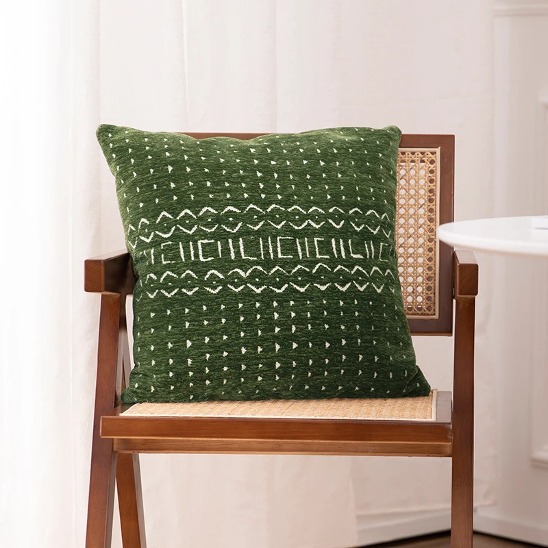 Dekorativer Kissenbezug mit gewebter Jacquard-Struktur und Ethno-Motiv