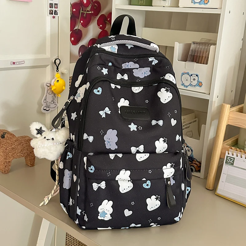Niedlicher Schulrucksack mit Grafikmuster