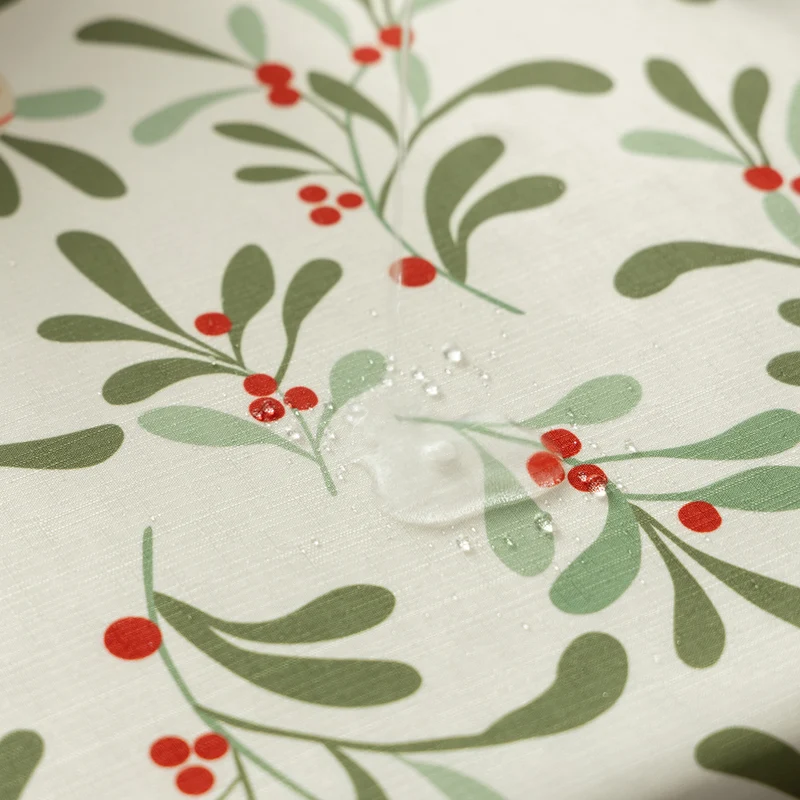 Festliche Tischdecke mit gewelltem Saum und Mistelzweig‑Print