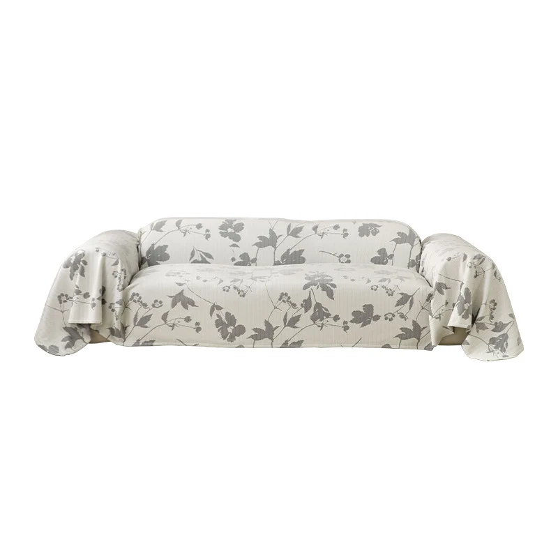 Elastischer Sofa‑Schonbezug mit floraler Reliefstruktur und universeller Passform