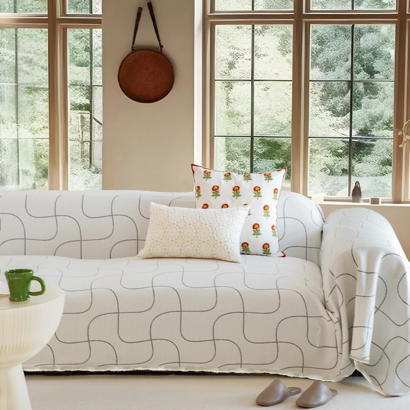 Gewebter Sofaüberwurf aus Baumwollmischgewebe mit geometrischem Muster