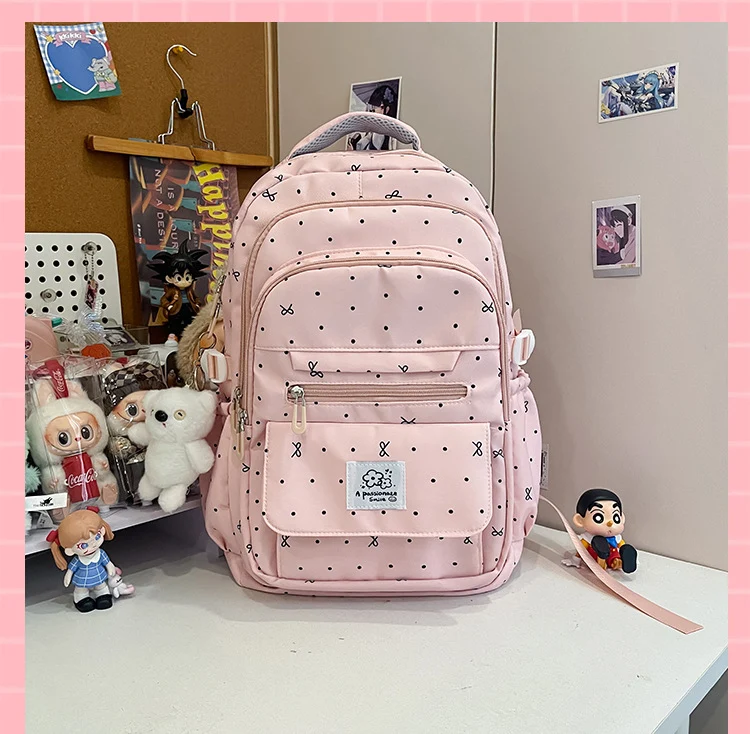 Charmanter Schulrucksack mit Tupfenmuster