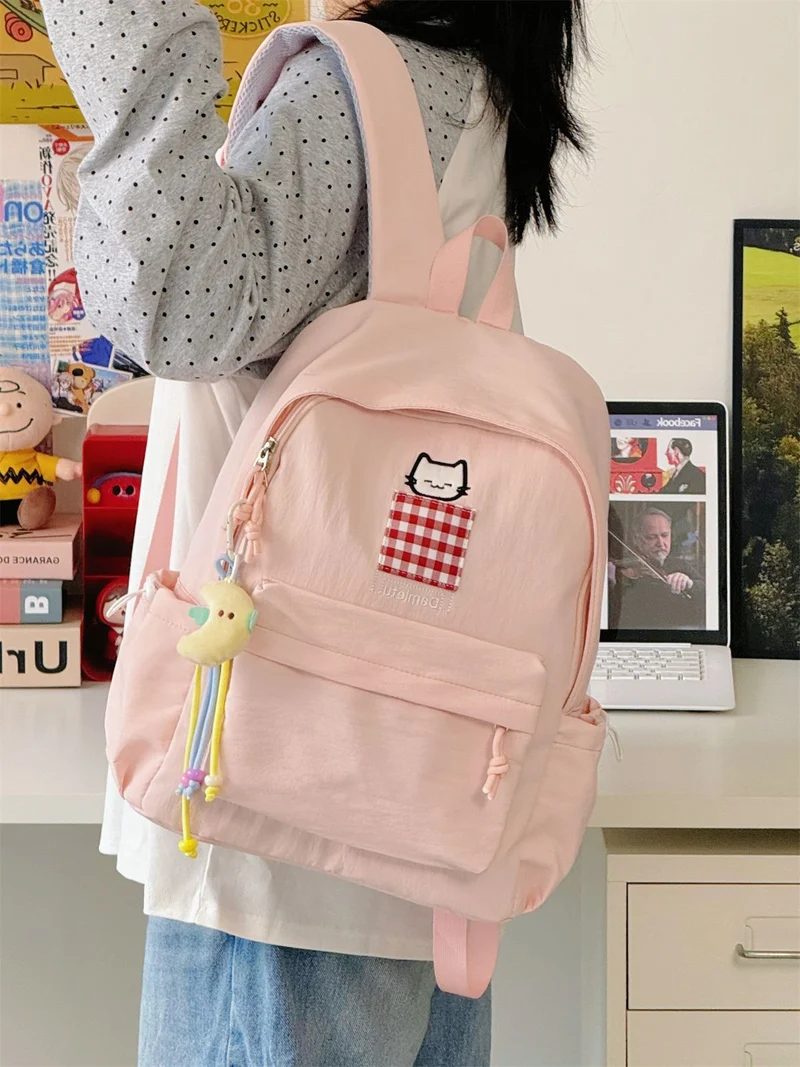 Kompakter Schulrucksack mit Katzenstickerei
