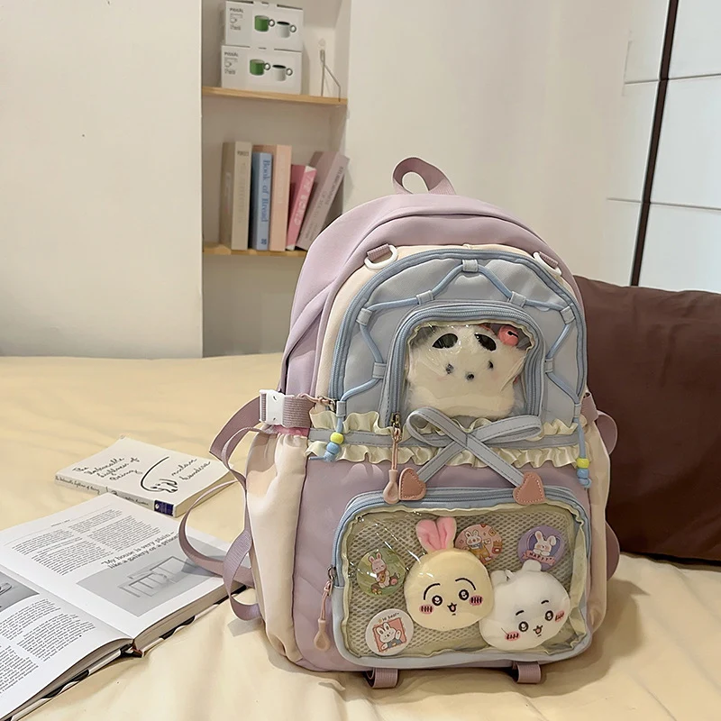 Niedlicher Schulrucksack mit mehreren Taschen und Charakter-Motiv
