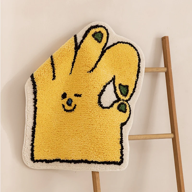 Geformter Badteppich in Handform mit tuftierter Chenille‑Textur und rutschfester Unterseite