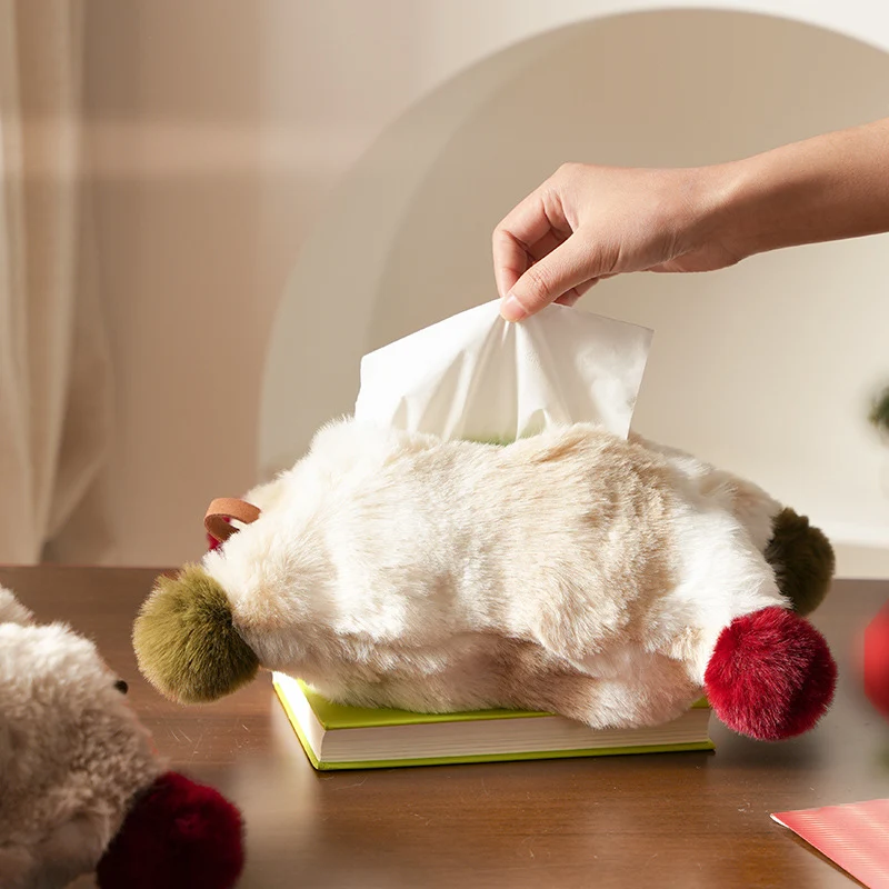 Handliche Taschentuch-Aufbewahrung aus Kunstfell mit Ledergriff und Bommel