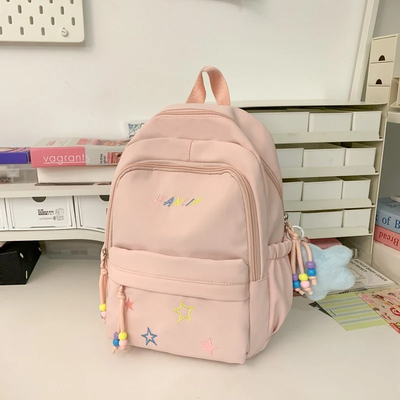 Verspielter mit Sternen verzierter Rucksack Karnz