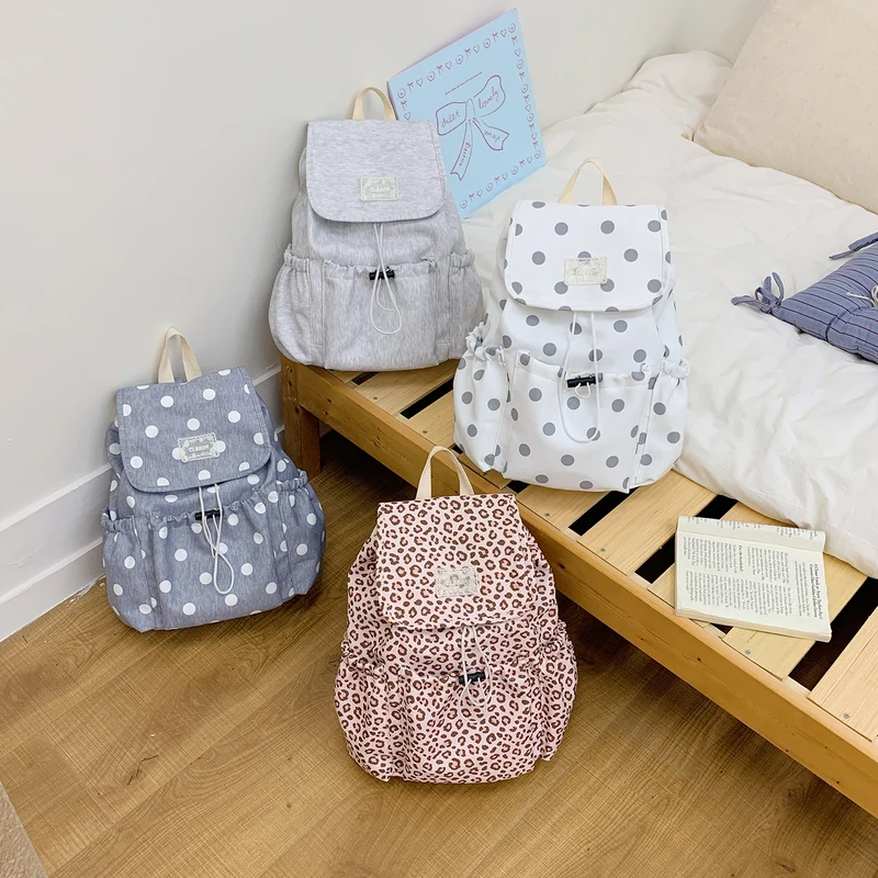 Verspielt gepunkteter Rucksack Karnz