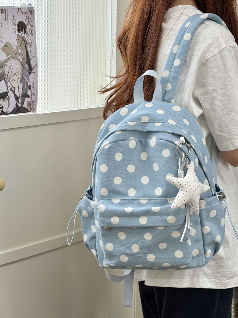 Verspielt gepunkteter Rucksack Karnz