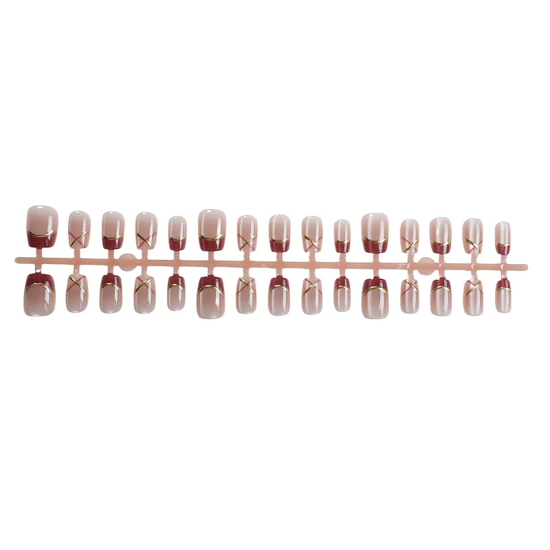 Kreatives Press-On Nagelkunst-Set mit eleganten Goldakzenten