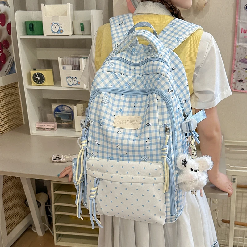 Dekorativer Rucksack mit Karos und Sternenmuster Karnz