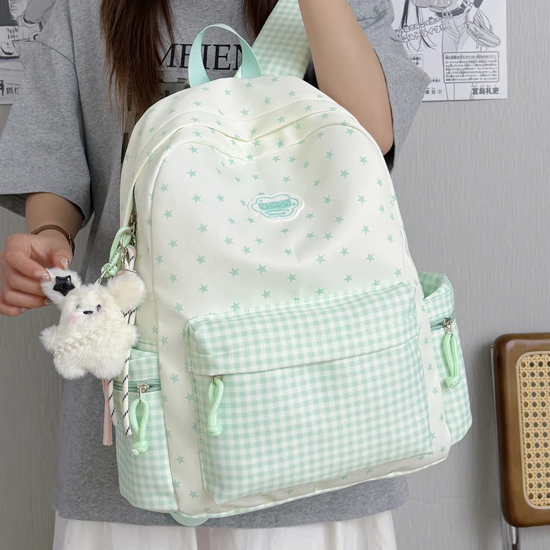 Spaßiger, glitzernder, mit Sternen verzierten Schulranzen Karnz