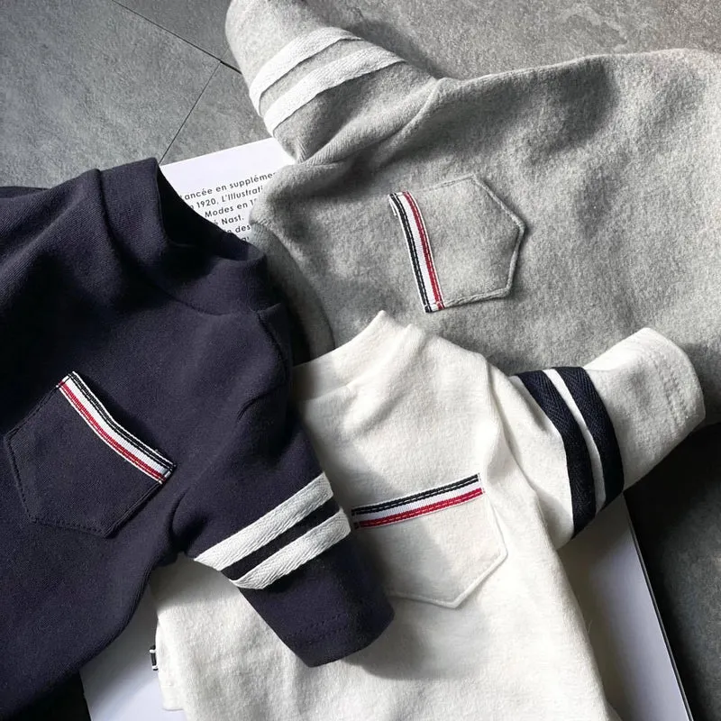 Baumwolle Polo Tee mit Brusttasche & gestreiften Ärmeln
