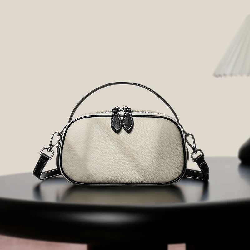 Strukturierte genarbte Leder-Top-Handle-Crossbody-Tasche mit abnehmbarem Riemen
