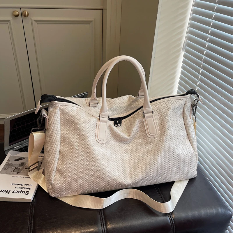 Elegante und robuste Reisetasche im modernen Wellenmuster Skanto