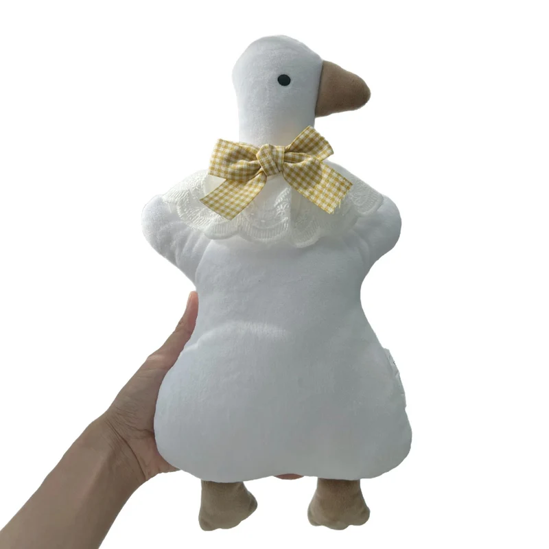 Plüsch-Ente Komfortkissen mit Gingham Schleife