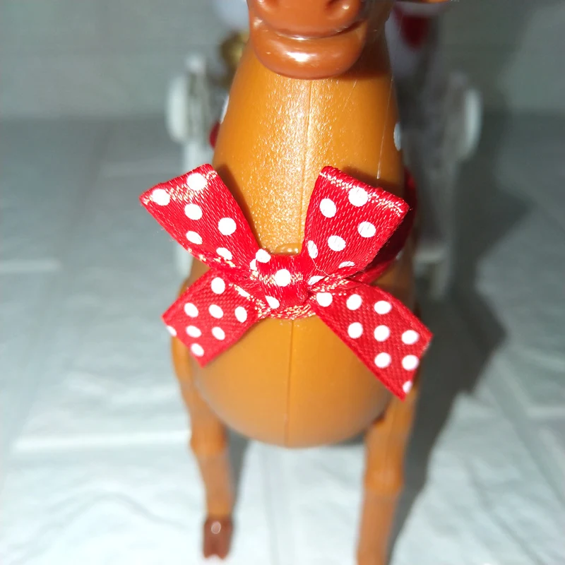 Weihnachtsdekorationsschlitten mit Rentier