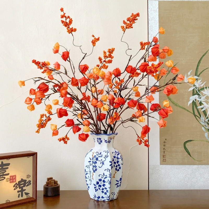 Dekorative Blumenast für die Hauseinrichtung