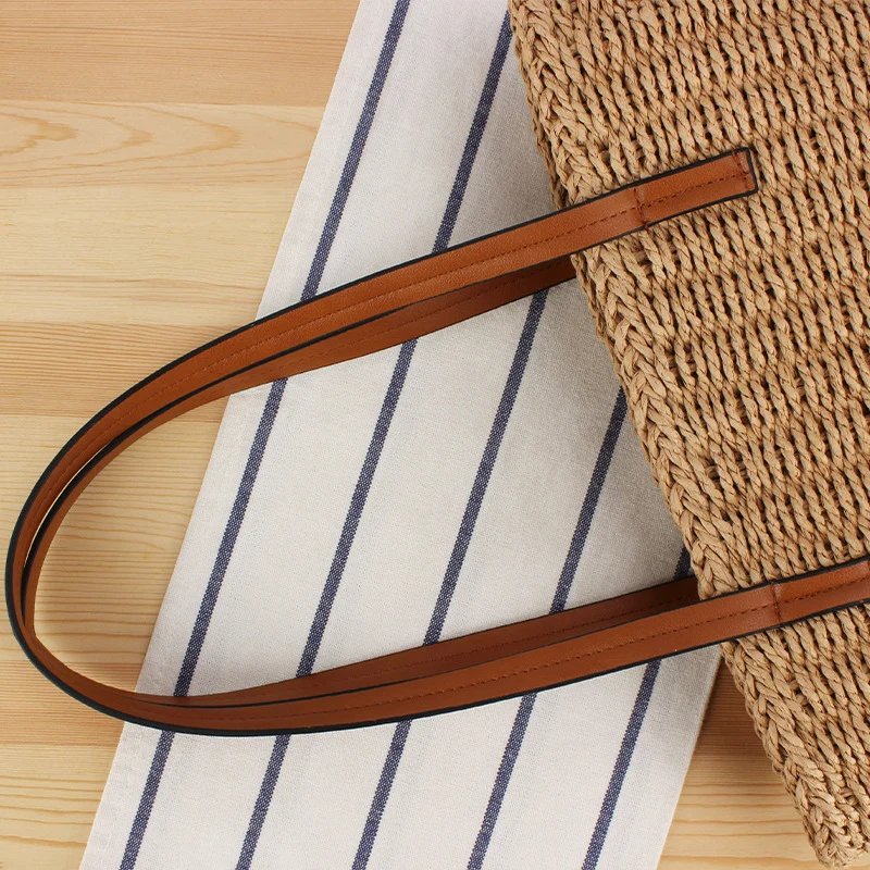 Handtasche aus Naturgeflecht mit Ledergriffen Skanto