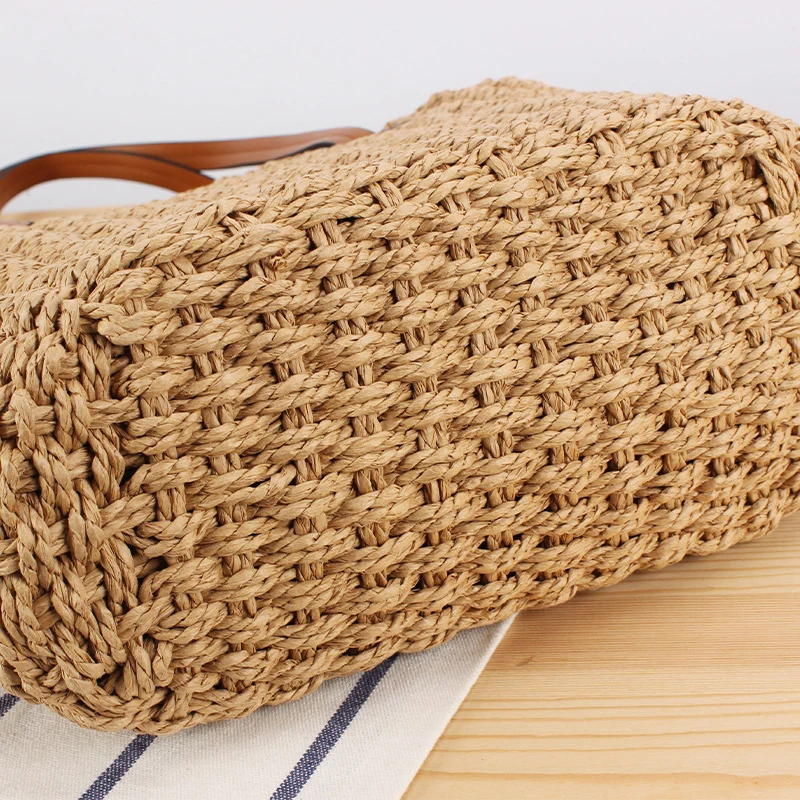 Handtasche aus Naturgeflecht mit Ledergriffen Skanto