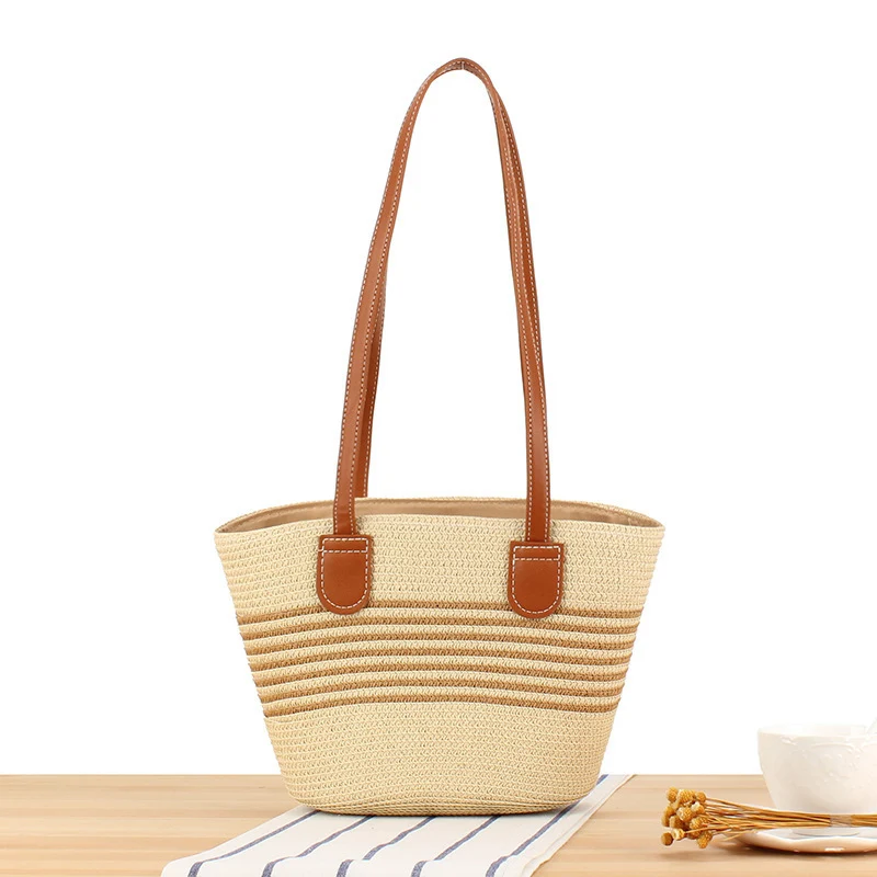 Handtasche aus hochwertigem Bast mit eleganten Ledergriffen Skanto