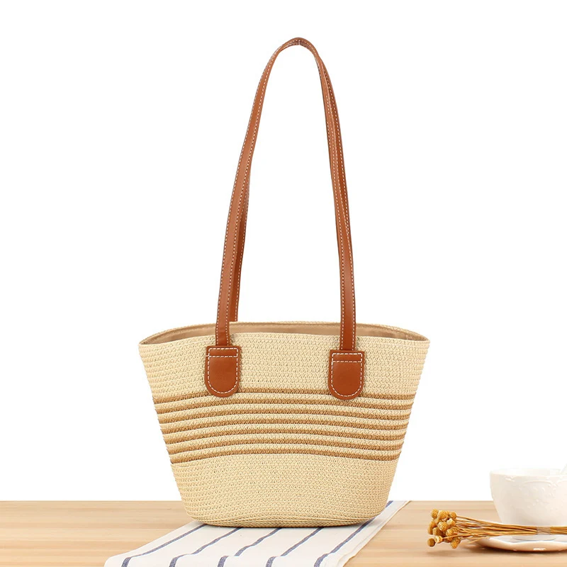 Handtasche aus hochwertigem Bast mit eleganten Ledergriffen Skanto