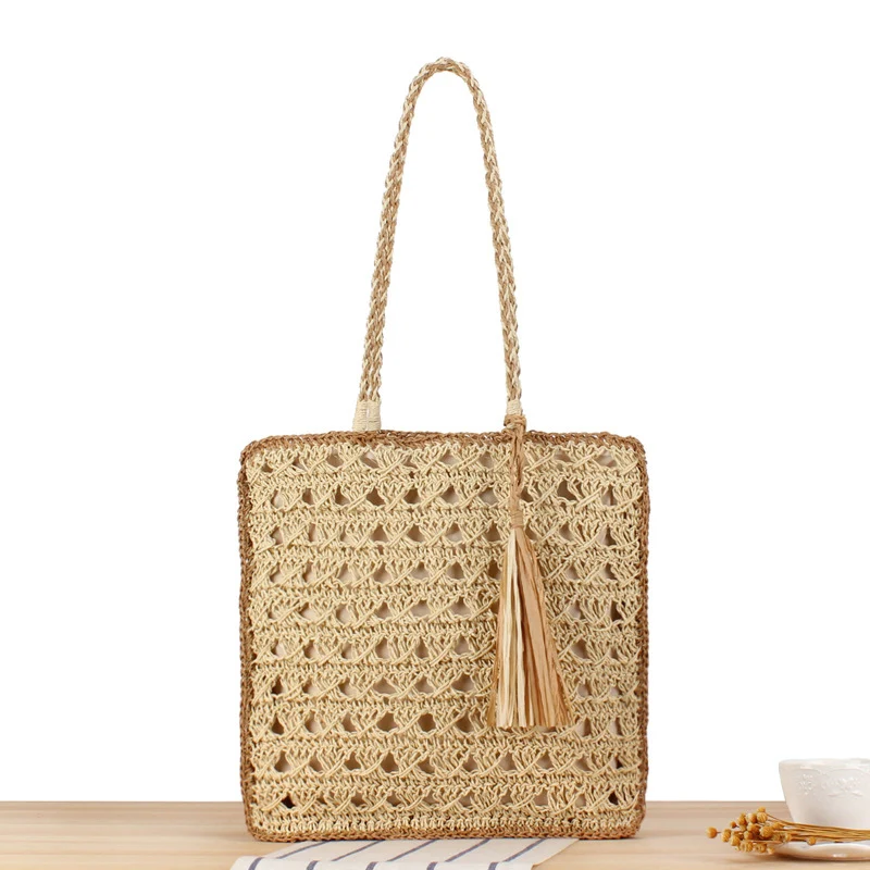 Handtasche aus handgewebtem Naturmaterial mit ansprechendem Fransen-Detail Skanto