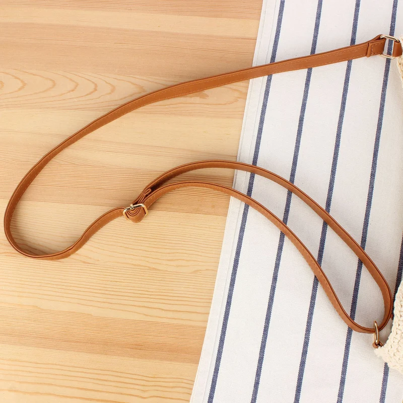 Handtasche aus handgewebtem Naturmaterial mit Lederakzenten Skanto