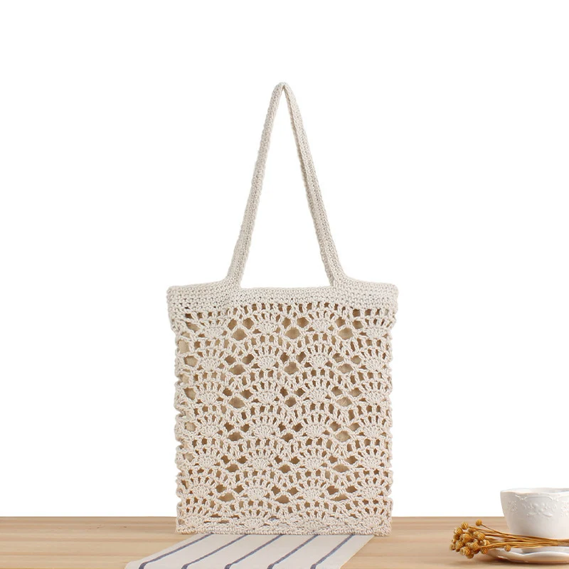 Handtasche aus handgeknüpftem Naturmaterial mit eleganten Details Skanto