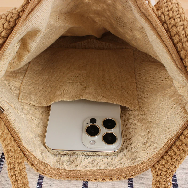 Handtasche aus handgeknüpftem Naturmaterial mit eleganten Details Skanto