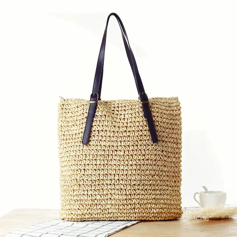Handtasche aus handgefertigtem Naturmaterial mit robusten Ledergriffen Skanto