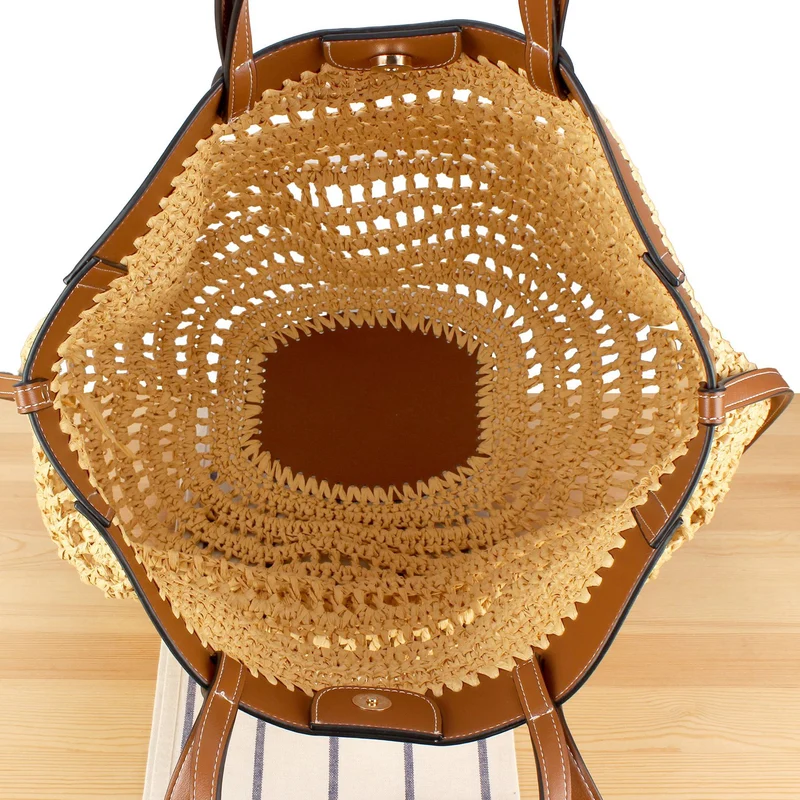 Handtasche aus geflochtenem Naturmaterial mit hochwertigem Lederdetail Skanto