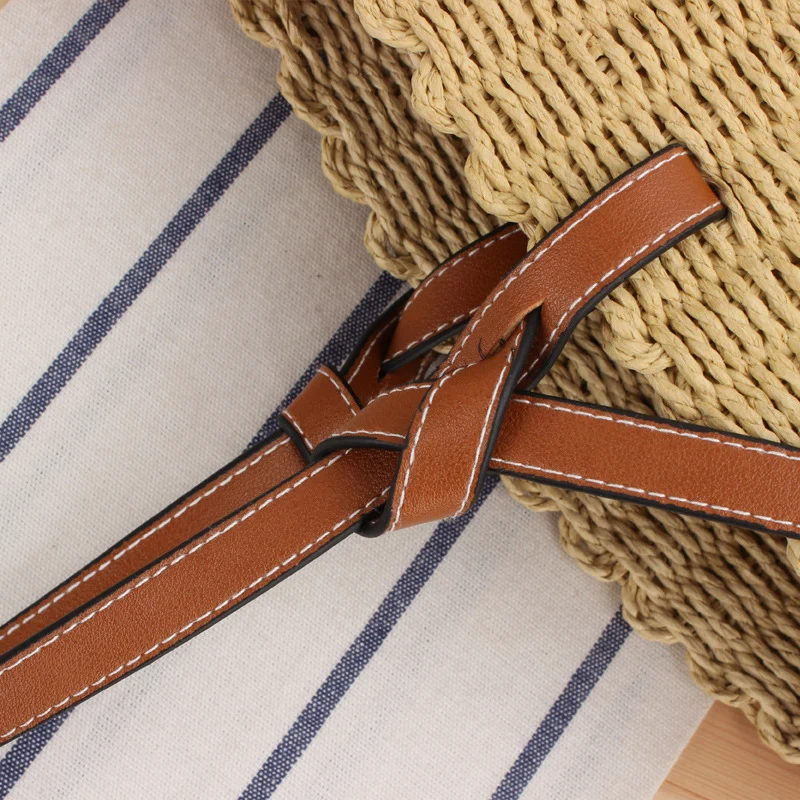 Handtasche aus geflochtenem Naturmaterial mit eleganten Ledergriffen Skanto