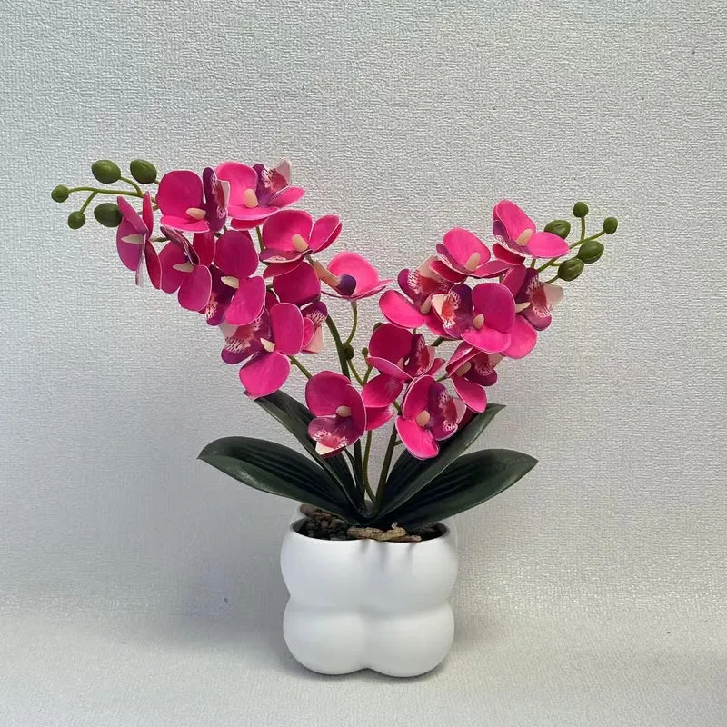 Lebensechte Orchideen Tischmittelstück