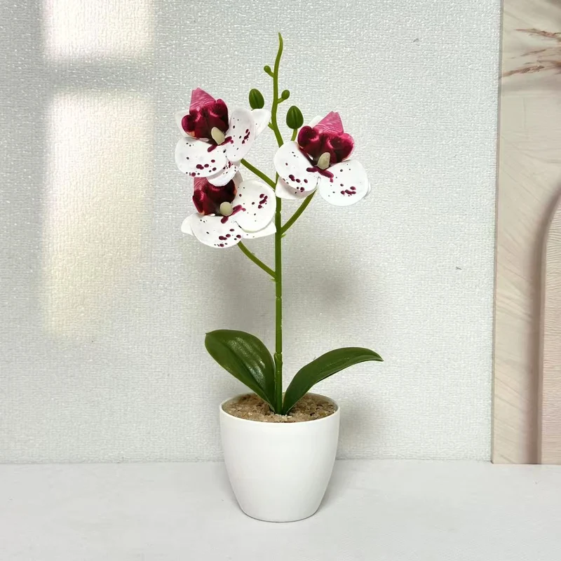 Elegante Kunst-Orchideen-Pflanzenschmuck