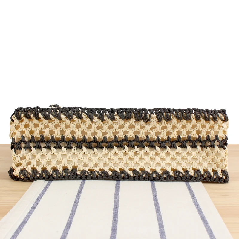 Handtasche mit robustem Flechtdesign und eleganten Ledergriffen Skanto