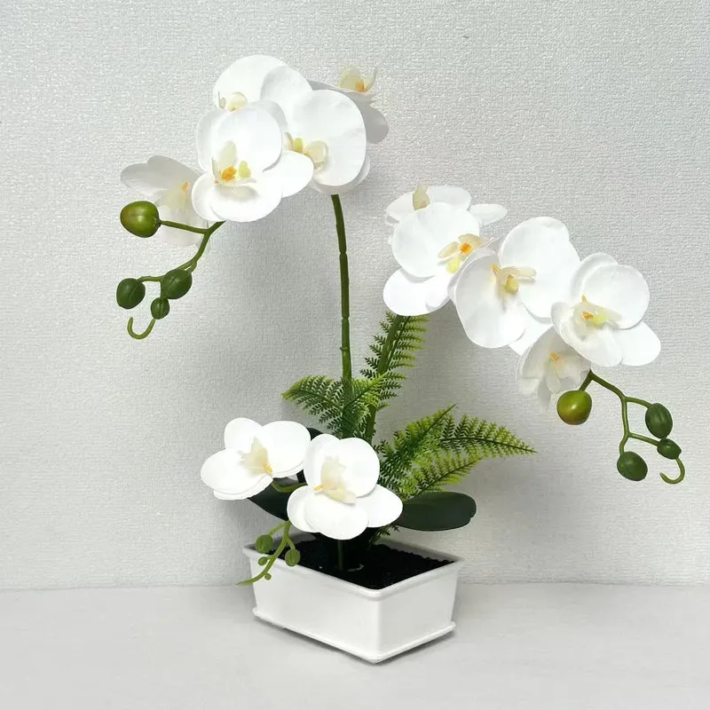 Elegante künstliche Orchideenarrangement für die Innendekoration